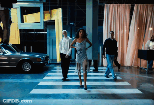 Woman In Blue Dress Crossing Crosswalk GIF