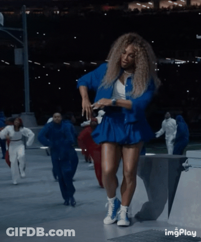 Woman In Blue Dress Dancing GIF