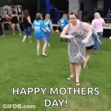 Woman In Blue Dress Dancing In Field GIF