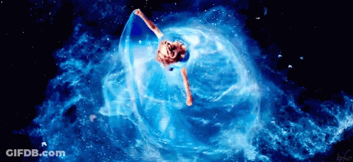 Woman In Blue Dress Floating In Bubble GIF