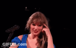 Woman In Blue Dress Giving Middle Finger GIF