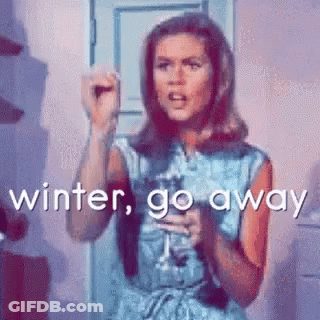 Woman In Blue Dress Holding Wine Making Funny Face GIF
