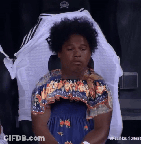 Woman In Blue Dress In Front Of Real Madrid Jersey GIF