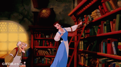 Woman In Blue Dress In Library Next To Older Man GIF