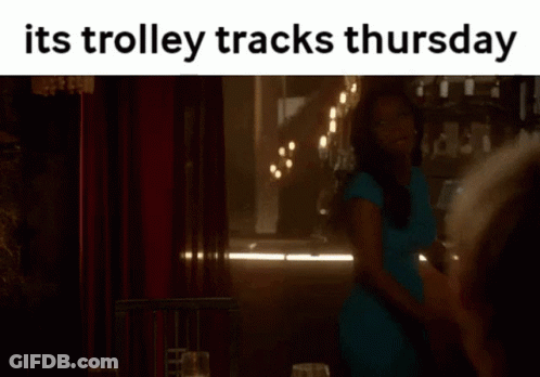 Woman In Blue Dress Its Trolley Tracks Thursday GIF