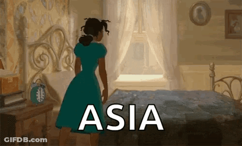 Woman In Blue Dress Next To Bed With Asia GIF
