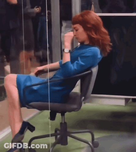 Woman In Blue Dress On Office Chair GIF