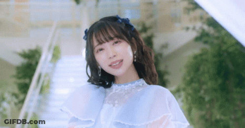 Woman In Blue Dress On Stairs GIF
