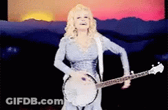 Woman In Blue Dress Playing Banjo And Singing GIF