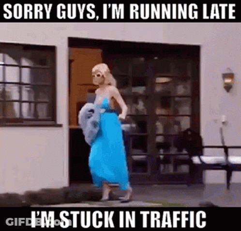 Woman In Blue Dress Running Late In Traffic GIF