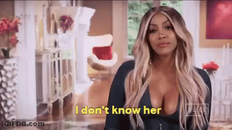 Woman In Blue Dress Saying I Don't Know Her GIF