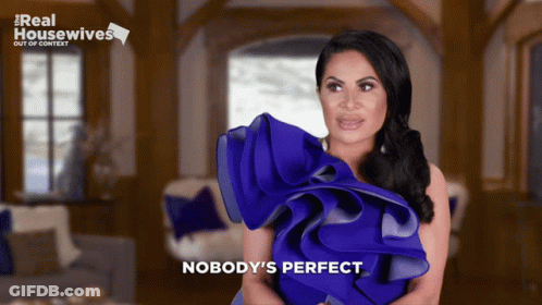 Woman In Blue Dress Saying Nobody's Perfect GIF
