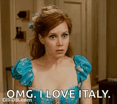 Woman In Blue Dress Saying OMG I Love Italy GIF