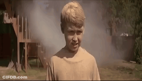 Woman In Blue Dress Saying Welcome Back GIF