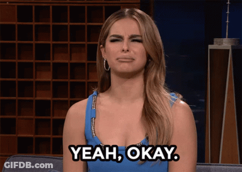 Woman In Blue Dress Saying Yeah Okay GIF