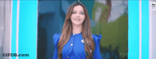 Woman In Blue Dress Standing GIF