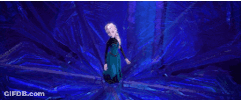 Woman In Blue Dress Standing In Dark Room Surrounded By Water GIF