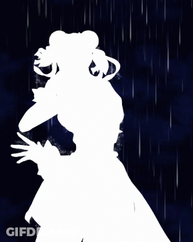 Woman In Blue Dress Standing In Rain With Fist Up GIF