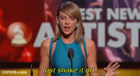 Woman In Blue Dress Talking At Microphone GIF