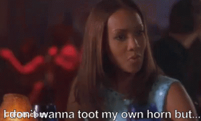 Woman In Blue Dress Talking In Club GIF