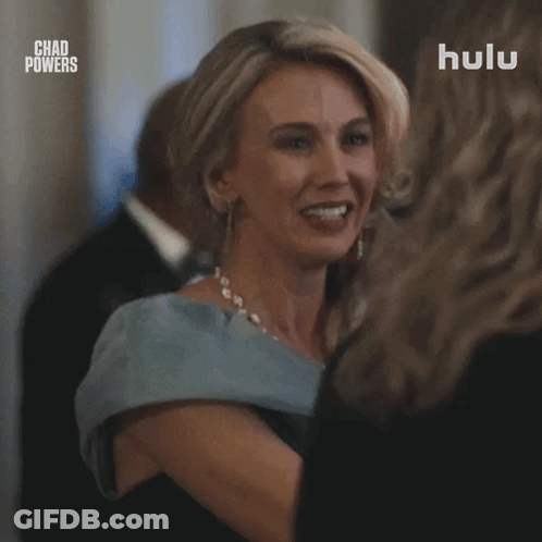 Woman In Blue Dress Talking In Hulu Advertisement GIF