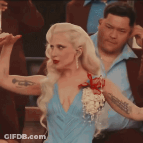 Woman In Blue Dress Tattooed Trumpet GIF