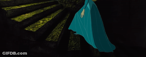 Woman In Blue Dress Walking Down Dark Stairs GIF