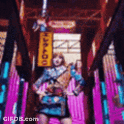 Woman In Blue Dress With Tokyo Sign In Tunnel GIF