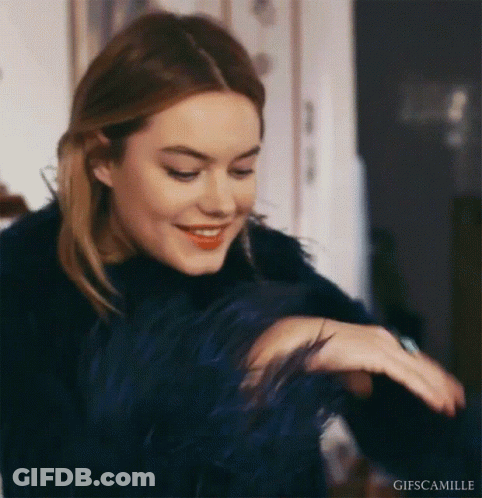 Woman In Blue Fur Coat Smiling GIF