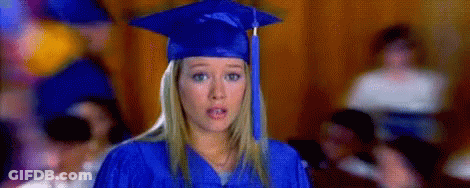 Woman In Blue Graduation Cap And Gown GIF