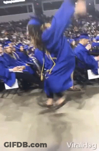 Woman In Blue Graduation Gown Jumping GIF