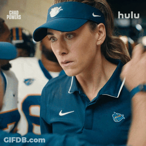 Woman In Blue Hat And Blue Shirt With Hulu Logo GIF