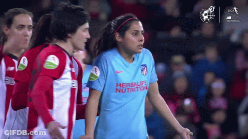 Woman In Blue Herbalife Nutrition Shirt With Teammates GIF