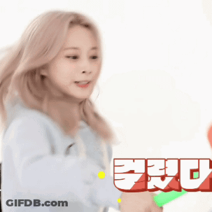 Woman In Blue Hoodie Holding Green Water Gun GIF