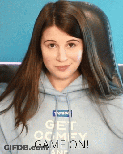 Woman In Blue Hoodie Saying Get Comfy Game On GIF