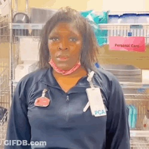 Woman In Blue Jacket And Name Tag GIF