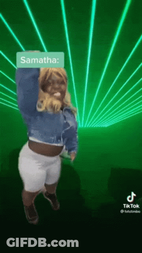 Woman In Blue Jacket Dancing With Lasers GIF