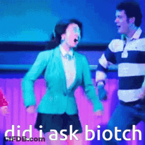 Woman In Blue Jacket Dancing With Man GIF
