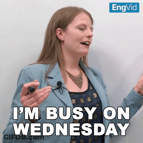 Woman In Blue Jacket Holding Microphone Says I'm Busy On Wednesday GIF