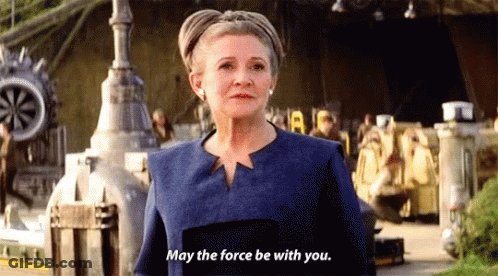 Woman In Blue Jacket Saying May The Force Be With You GIF