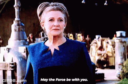 Woman In Blue Jacket Saying May The Force Be With You GIF