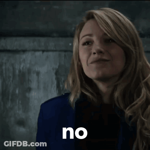 Woman In Blue Jacket Saying No GIF