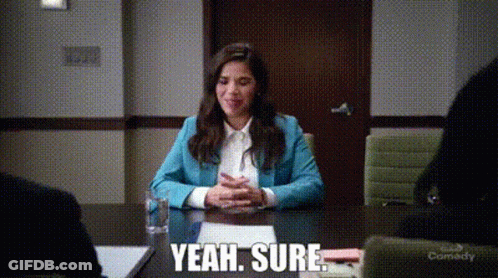 Woman In Blue Jacket Saying Yeah Sure GIF