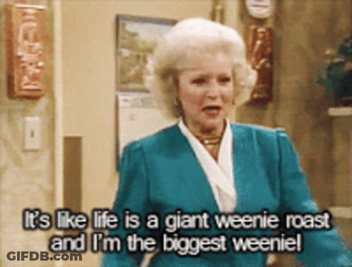 Woman In Blue Jacket Says Life Is A Giant Weenie Roast GIF