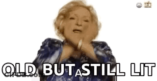 Woman In Blue Jacket Says Old But Still Lit GIF