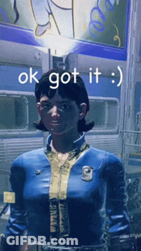 Woman In Blue Jacket Standing In Front Of Ok Got It Sign GIF