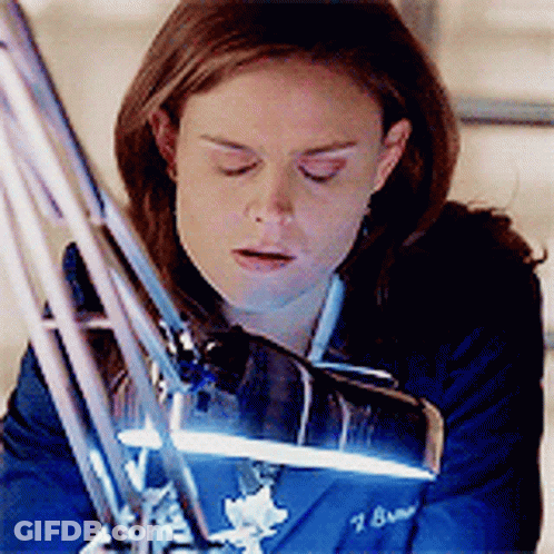 Woman In Blue Jacket With Number 7 GIF