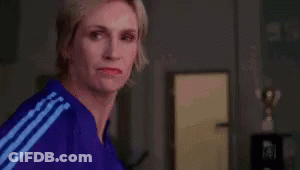 Woman In Blue Jacket With White Stripes GIF