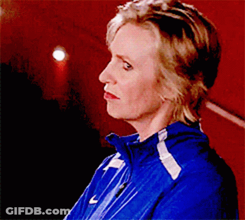 Woman In Blue Jacket With White Stripes GIF