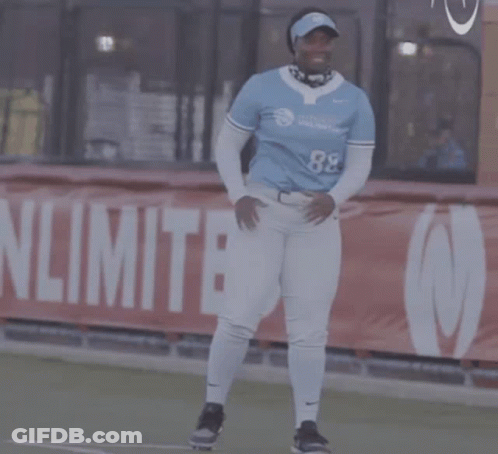 Woman In Blue Jersey Number 8E GIF